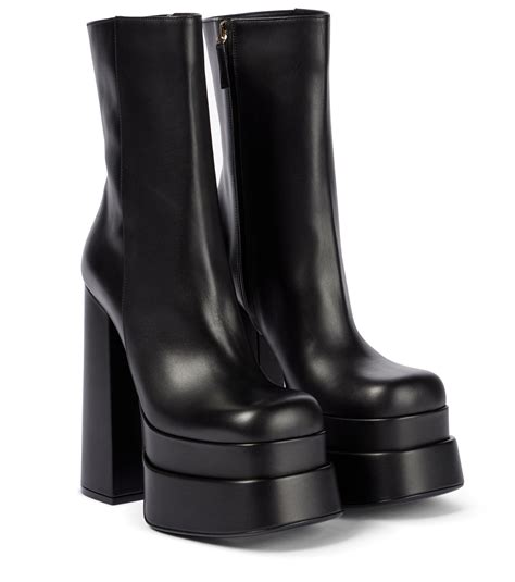 VERSACE: leather boots with platform 